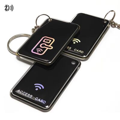 การ์ดควบคุมการเข้าถึงการพิมพ์ที่กําหนดเอง NFC 13.56Mhz RFID Epoxy Tag NFC Keychain MIFARE Classic EV1 1K